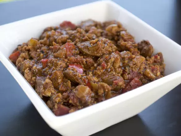 Куриные сердечки в томатном соусе