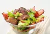 Тушеная куриная печень с овощами