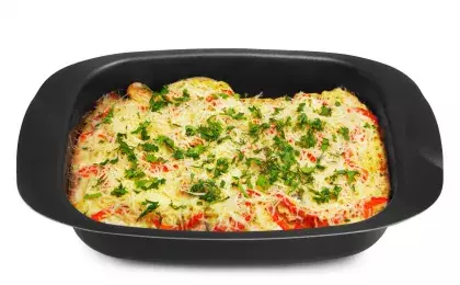 Сазан, запеченный с овощами